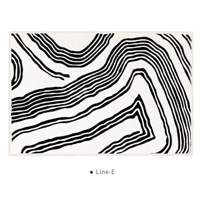 “The Monolith Curve” — Tufted Linework Rug from the Liora Kessan Studio Collection